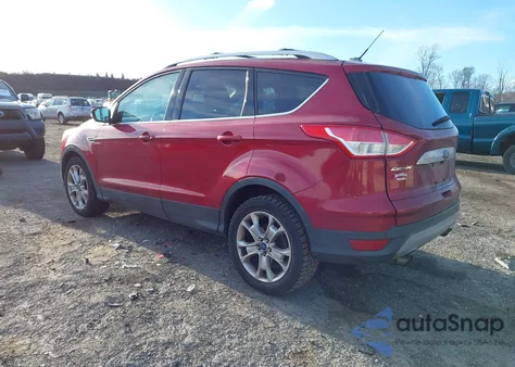 2014 Ford Escape Titanium z USA, uszkodzony, nr VIN 1FMCU9J90EUA81175
